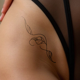 Pflanzenranke Tattoo