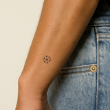 Schneeflocke Tattoo